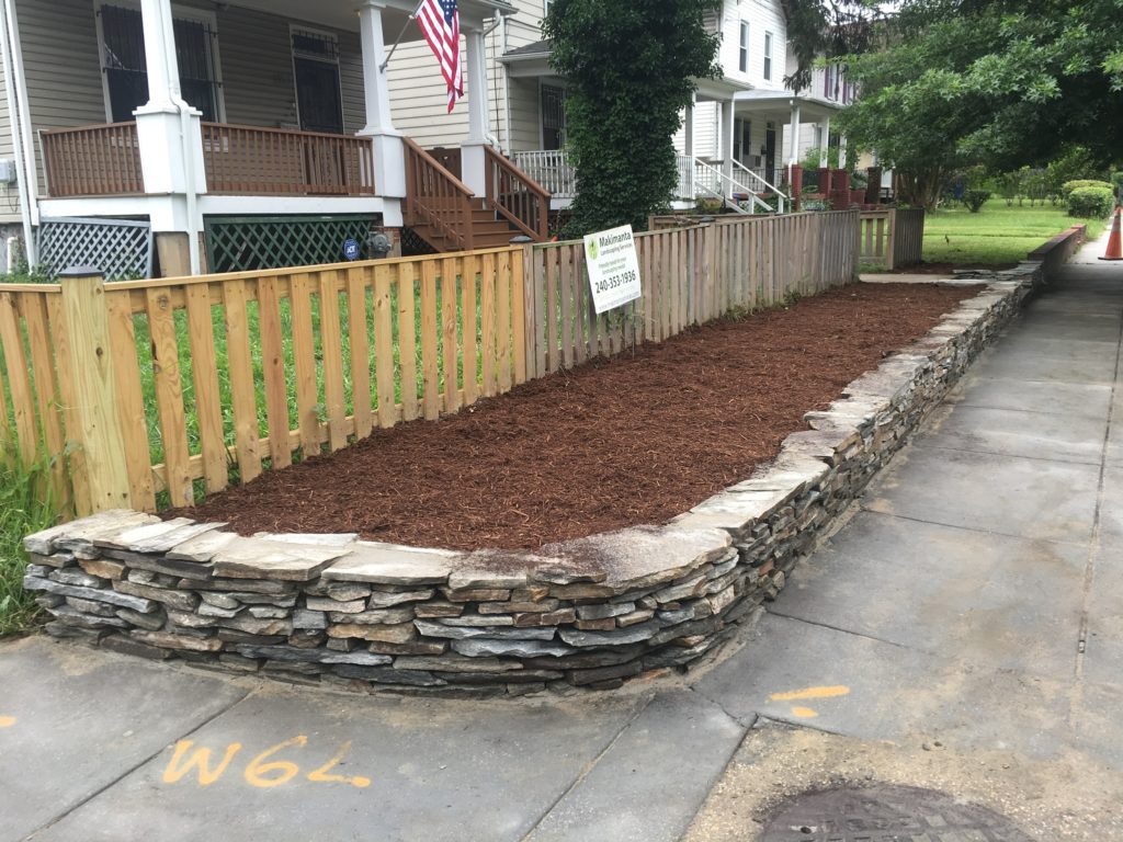 Stone Retaining Wall and New Flowerbed » Makimanta Services